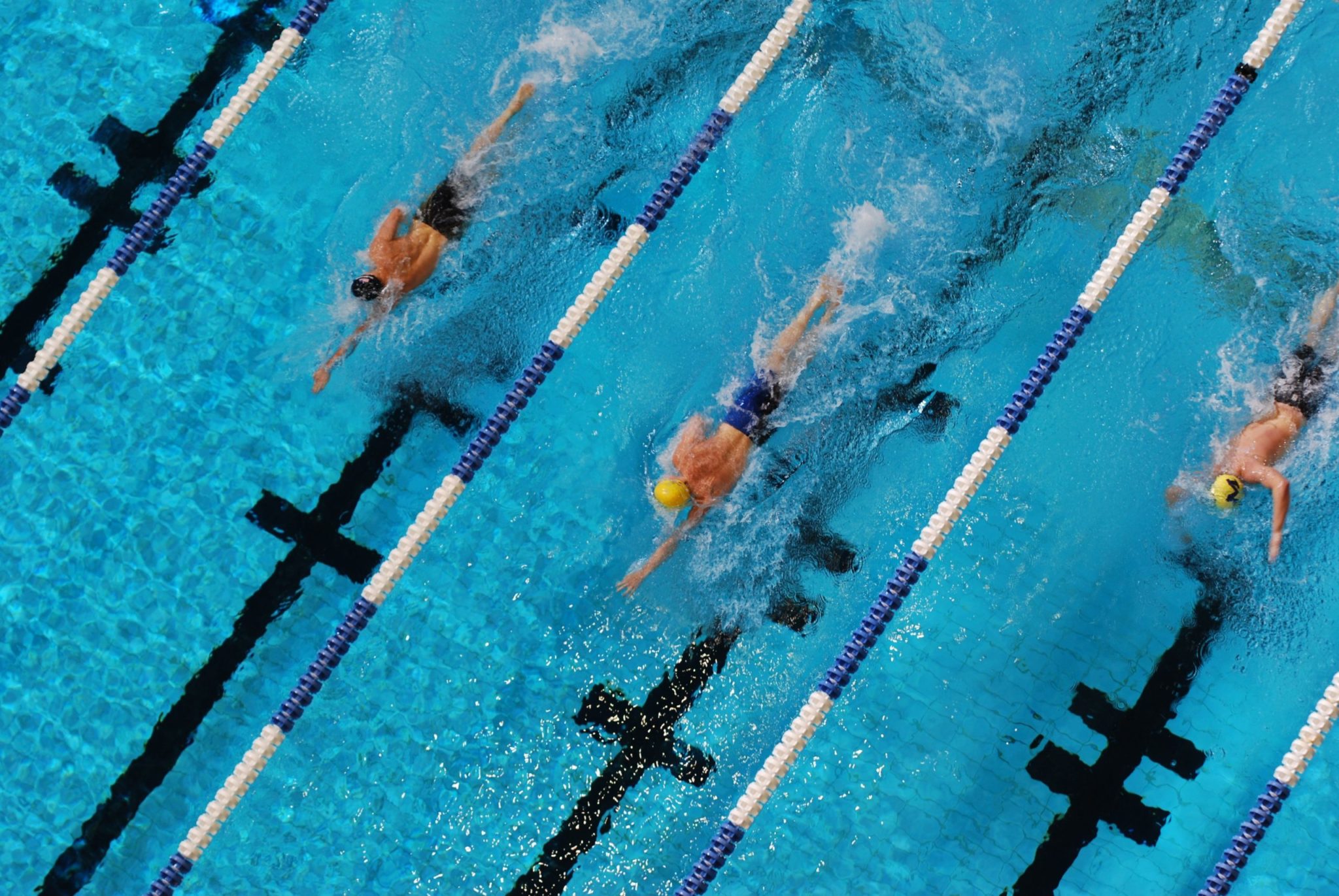 people showing swimming drills