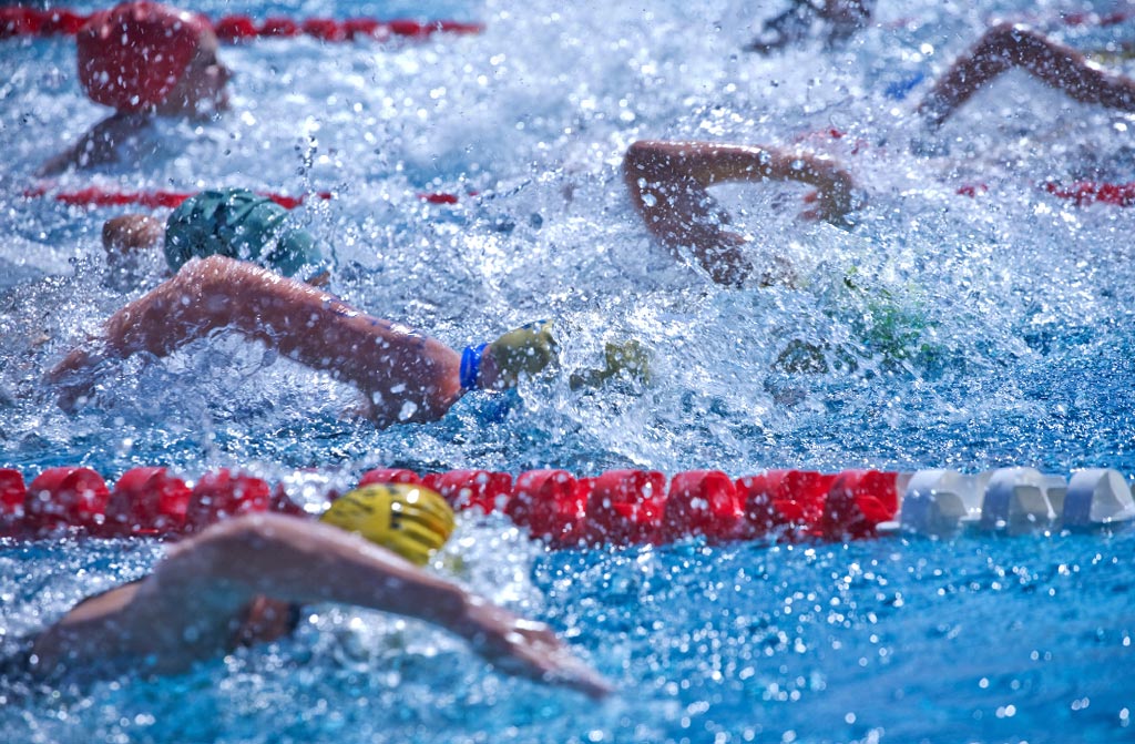 people swimming on a fundraising for swimming club