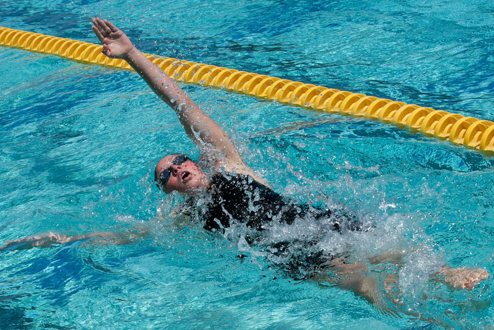 a lady doing backstrokes